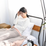 体調不良の女性