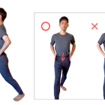 立つ